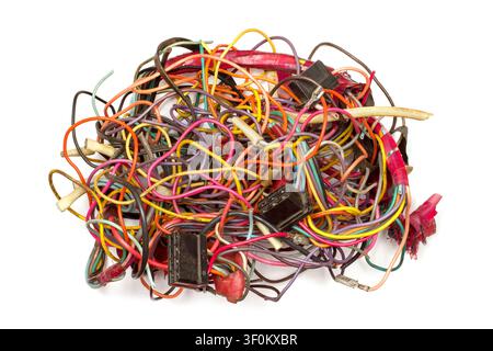 A lot of multi-colored wires. Tangled wiring on a white background. Old car wiring. Stock Photo
