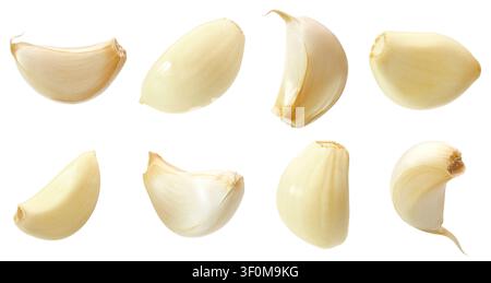 Peeled and unpeeled garlic cloves isolated on white background Stock Photo