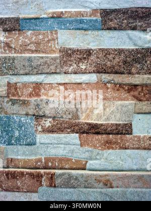 Surface features a natural stone wall covering with irregular rectangles in shades of brown, gray, and cream. This texture adds depth and character to Stock Photo