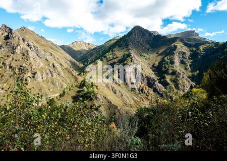 Rugged rocky peaks and layered mountain ridges of the Greater Caucasus Range in Dagestan, southern Russia. Stock Photo