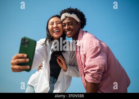 Couple enjoying travel, creating unforgettable memories through their passion for travel photography Stock Photo