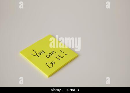 Motivational Yellow Sticky Note Isolated on White Stock Photo