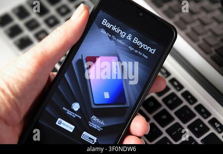Revolut bank website on mobile phone screen Stock Photo
