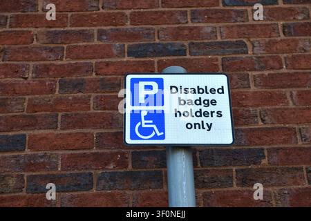 Disabled Badge Holders Parking Area Only Stock Photo