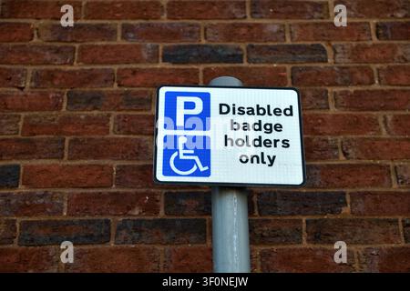 Disabled Badge Holders Parking Area Only Stock Photo