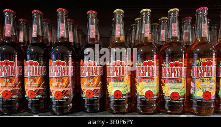 JUVISY, FRANCE - September 27, 2025. Bottles of white wine displayed on a supermarket shelf in France featuring elegant design and vibrant labelsAssor Stock Photo