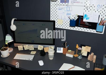 Modern Office Workspace Displaying Analytics Dashboard for Planning Stock Photo
