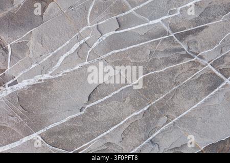 Abstract Gray Stone Surface With White Vein Patterns Stock Photo