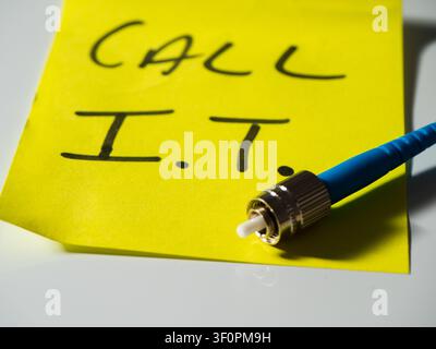 Reminder note to call network technician  Stock Photo