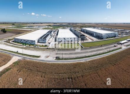 Aerial view of a large data center campus in Hutto, Texas, with three massive buildings with 400M square feet of space and 600MW power capacity Stock Photo