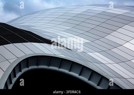 Modern curved roof of the Sage theatre in Gateshead UK showcasing elegant contemporary architecture with sweeping lines and geometric design Stock Photo