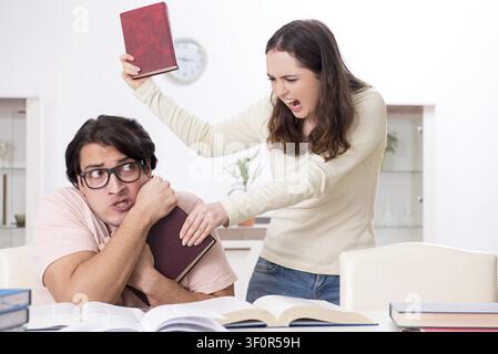 Students preparing for exam together at home Stock Photo