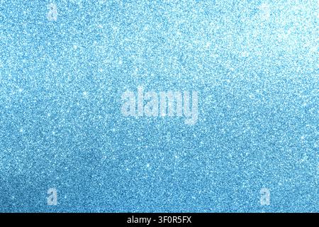 Blue glitter background with shimmering texture for festive and elegant design projects Stock Photo