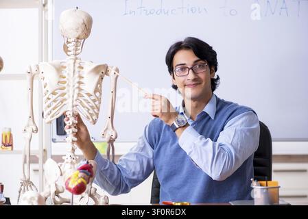 Young lecturer teacher teaching anatomy Stock Photo