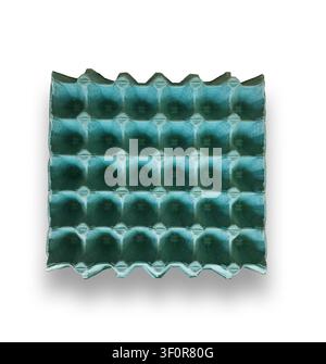 Empty turquoise cardboard egg carton isolated on white background. Stock Photo