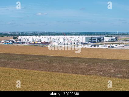 Hutto, Texas - July 4, 2026: Aerial view of a large data center campus with three massive buildings with 400M sq ft of space and 600MW power capacity Stock Photo