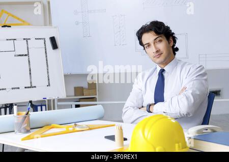 Young handsome architect working on the project Stock Photo