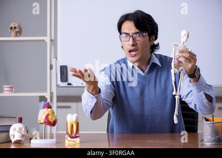 Young lecturer teacher teaching anatomy Stock Photo
