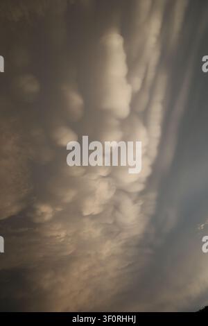 Dramatic Mammatus Clouds Before Storm Stock Photo