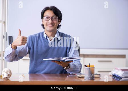 Young lecturer teacher teaching anatomy Stock Photo