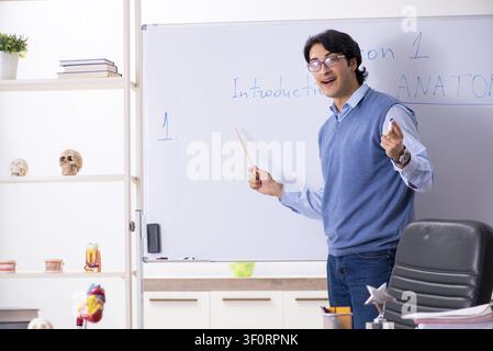 Young lecturer teacher teaching anatomy Stock Photo