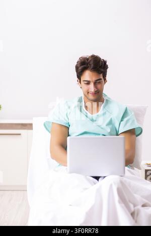 Young handsome man staying in hospital Stock Photo