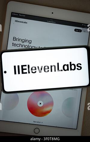 Mexico city, mexico, 06 04 2026, elevenlabs logo displayed on a smartphone screen over a tablet showing the website Stock Photo
