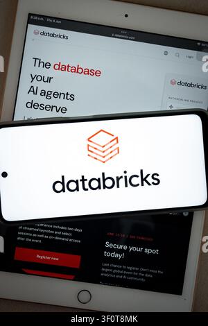 Mexico city, mexico, 06 04 2026, smartphone displaying the databricks logo over a tablet showing the databricks website Stock Photo