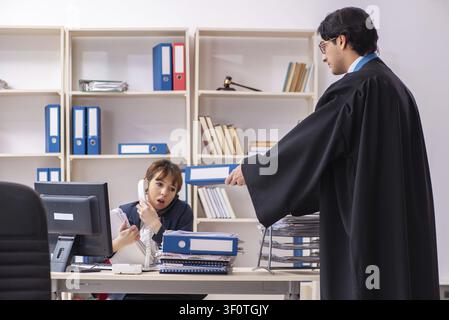 Two lawyers working in the office Stock Photo