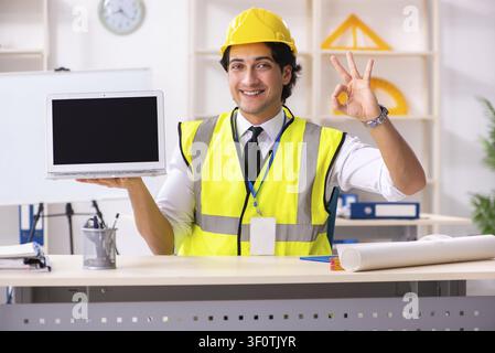 Male construction engineer working in the office Stock Photo