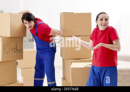 Professional movers doing home relocation Stock Photo