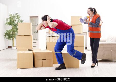 Professional movers doing home relocation Stock Photo