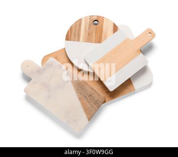 Assortment of modern wooden and marble cutting boards for kitchen and food preparation, isolated on a white background Stock Photo