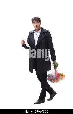 Young handsome man with vegatables in shopping concept Stock Photo
