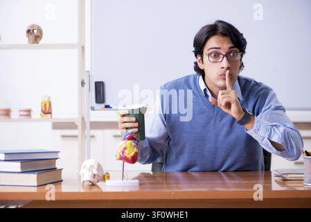 Young lecturer teacher teaching anatomy Stock Photo