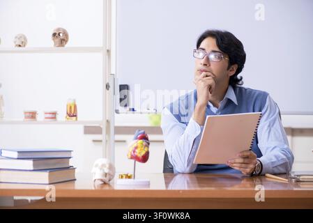 Young lecturer teacher teaching anatomy Stock Photo