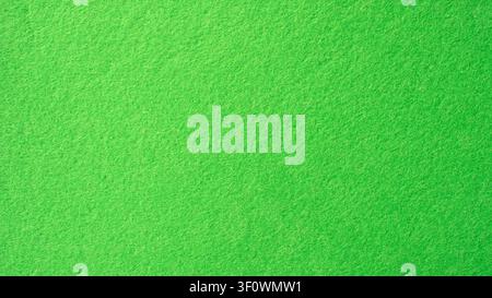 Bright green felt fabric texture background close up Stock Photo