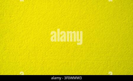 Vibrant yellow felt texture background for craft and design Stock Photo
