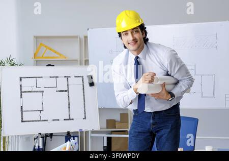 Young handsome architect working on the project Stock Photo