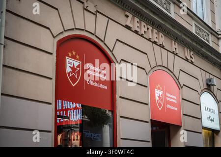 BELGRADE, SERBIA - JUNE 13, 2026: Crvena Zvezda logo signage appears on the official store facade in Belgrade, Serbia, on Serbian football culture, Re Stock Photo