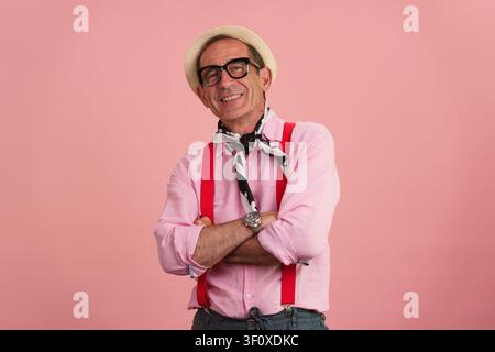 Senior man smiling, embracing positive healthy maturity Stock Photo