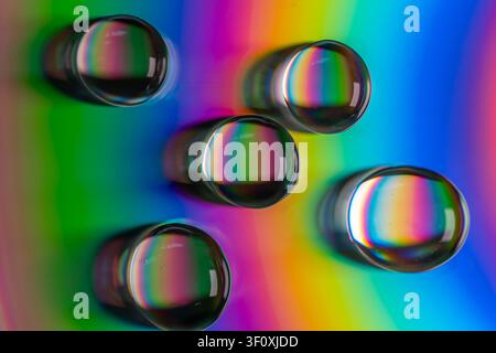 Macro Texture with Water Drops Scattering Colorful Light Stock Photo