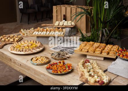 Elegant catering buffet with assorted appetizers and finger food for corporate event Stock Photo