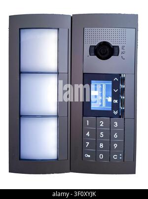 This intercom system features a clear screen and keypad, designed for secure communication. It is suitable for use in home environments, enhancing saf Stock Photo