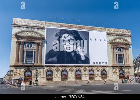 Large advertising billboard for Spectacles, aka Specs, standalone augmented reality (AR) glasses, over the main facade of the Paris opera house Stock Photo
