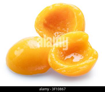 Peeled canned peach halves isolated on white background. File contains clipping paths. Stock Photo