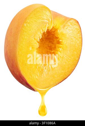 Slice of ​​peach fruit and peach juice dripping from it on a white background. File includes clipping path. Stock Photo