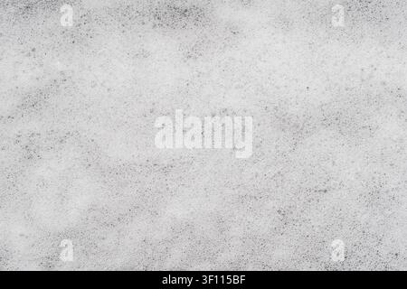 Full frame texture of dense white soap foam with many small bubbles. Stock Photo