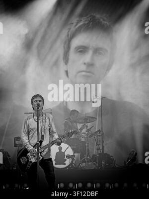 A spectral monochrome image of former Smiths guitarist Johnny Marr performing live at Manchester’s Castlefield Bowl Stock Photo