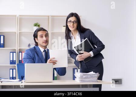 Two employees working in the office Stock Photo